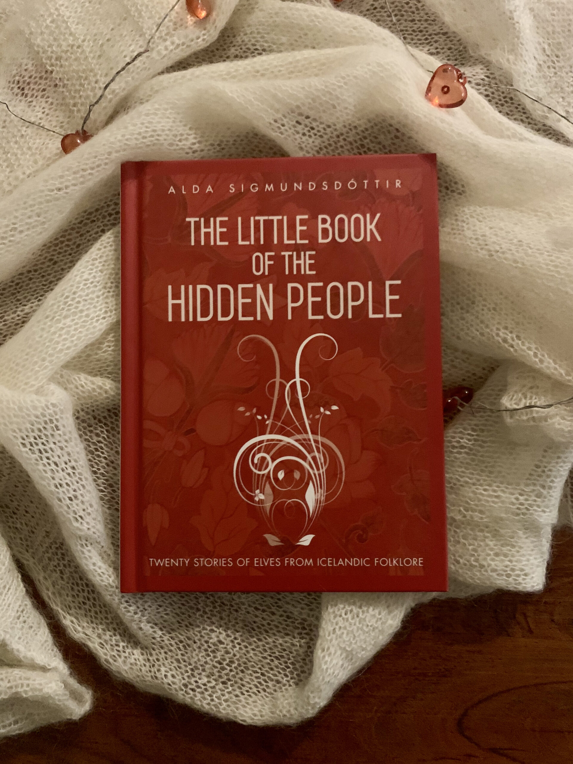 The Little Book of the Hidden People Hardcover copy of The Little Book of the Hidden People lying on a cloth